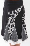 me_s12 Unique black and white paired designs doll up this double-layered and triangularly-pieced skirt! If you feel the need to conceal certain areas while still shining in the spotlight as trendy and chic then this jupe is for you!