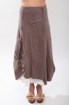 me_s3 Feel the summer breeze in this lightweight flowy skirt with an asymmetrical hem and pockets on the side! Comes in a trio of colors: coral, cafe, and navy.